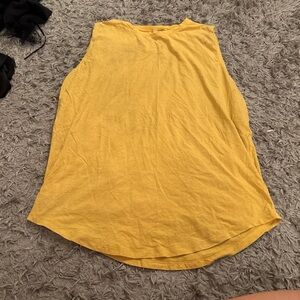 Yellow sleeveless tank top #tanktop